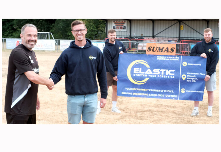 Matt Eggleston (left), commercial manager and joint-manager, with Sean Moore and staff from Elastic. Pic: Andrew Batt.