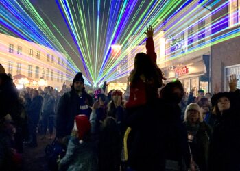 Trying to catch the beams of light at Wokingham's Winter Carnival. PIcture: Emma Merchant