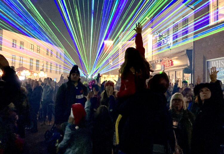 Trying to catch the beams of light at Wokingham's Winter Carnival. PIcture: Emma Merchant