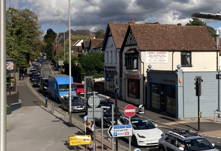 A view from the bridge, at Wokingham Station, shows traffic nose-to-nose today as motorists navigate closures in place for work on the South Distributor Road. Picture: Emma Merchant