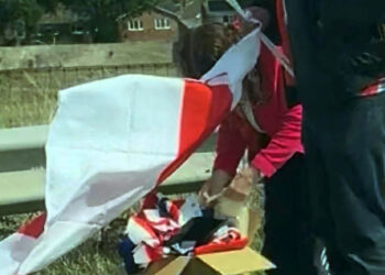 A reader caught the moment when the flags were installed.