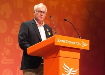 Clive Jones addressing the auditorium at Bournemouth International Centre. Pic: David Stone.