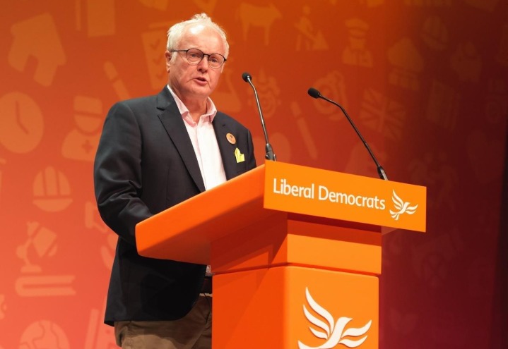 Clive Jones addressing the auditorium at Bournemouth International Centre. Pic: David Stone.