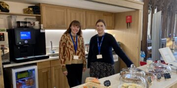 Laura and Ashley serving coffee, cakes, and snacks at Link Thursday. Picture: The Link