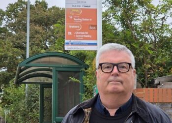 Councillor Greg Bello (Labour, Loddon) at a bus stop in Woodley. Credit: Earley and Woodley Labour Party