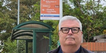 Councillor Greg Bello (Labour, Loddon) at a bus stop in Woodley. Credit: Earley and Woodley Labour Party