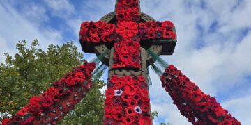 Arborfield Cross War Memorial is has been decorated with 6,000 crimson poppies. Picture: Gaynor White