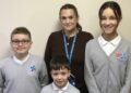 Headteacher Nicola Cotter with Windmill Primary School pupils. Picture: GLF Schools