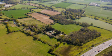 An aerial photo of the fields that will make up the Loddon Valley Garden Village major development. Credit: University of Reading