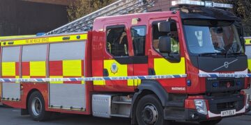 Thames Valley Police has announced that a large fire has broken out in woodland along Monks Lane, near the A339, behind Newbury College.