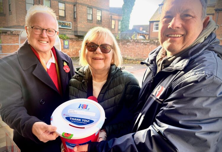 Clive Jones (left) with David \|Dunham (right) and his wife Kay. Pic: Andrew Batt.