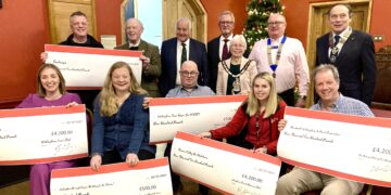Wokingham Charity Fireworks comittee members presented cheques to six charities at a celebration evening in Wokingham Town Hall. Picture: Emma Merchant