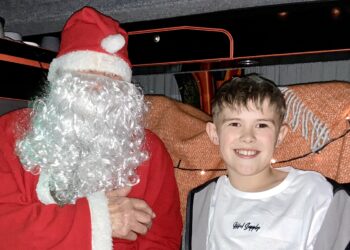 Families were able to enjoy Christmas fun at a party organised for Grub Club members in Wokingham's Cornerstone building. Picture: Emma Merchant