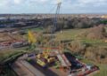 Each 125-tonne steel girder was installed using a, 500-tonne crane, helping to form part of what will be the new road. Pic: WBC.