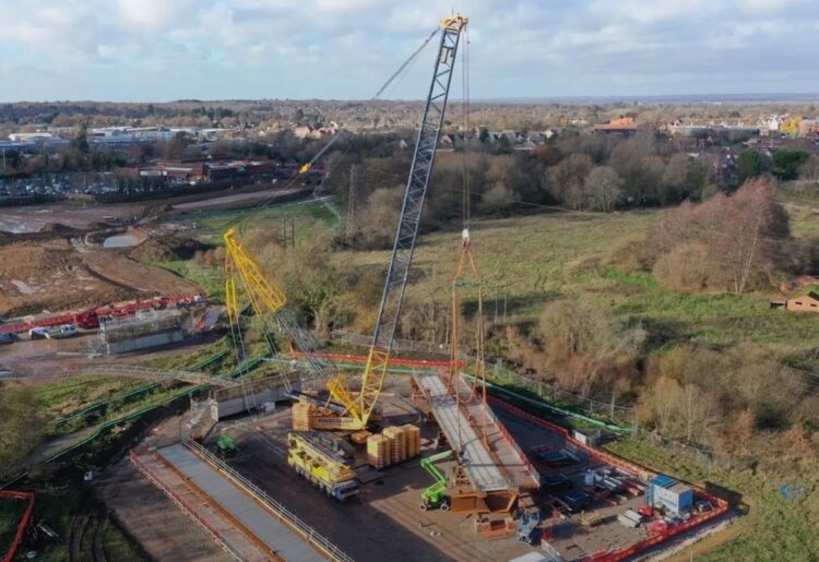 Each 125-tonne steel girder was installed using a, 500-tonne crane, helping to form part of what will be the new road. Pic: WBC.