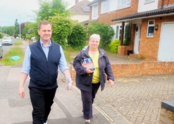 Former government minister Robert Jenrick with Pauline Jorgensen in Earley. Pic: Andrew Batt.