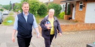 Former government minister Robert Jenrick with Pauline Jorgensen in Earley. Pic: Andrew Batt.