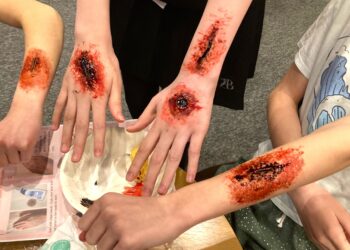 Wokingham Youth Theatre members enjoyed creating gory wounds. Picture: Emma Merchant