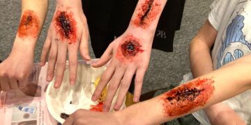 Wokingham Youth Theatre members enjoyed creating gory wounds. Picture: Emma Merchant