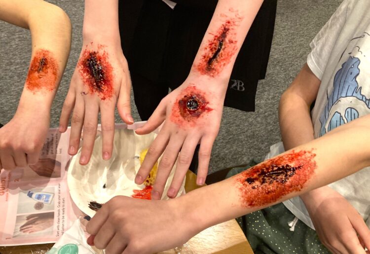 Wokingham Youth Theatre members enjoyed creating gory wounds. Picture: Emma Merchant