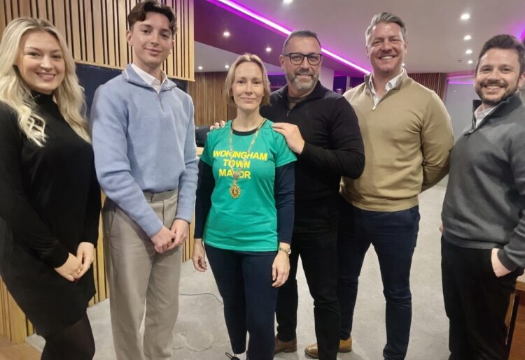 Mayor Lou Timlin with David Cliff and his team.