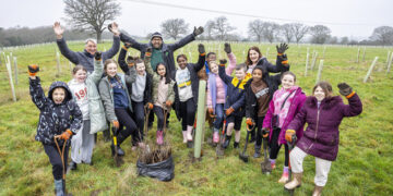 Shinfield St Mary?s Junior School has helped plant more than 130 young trees at the Covid Memorial Woodland. picture: Stewart Turkington