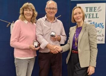 Wokingham Town Mayor Cllr Lou Timlin presented Wendy and Nigel Preston with Civic Awards, at The WELL, Wokingham. PIcture: courtesy of Kings Church