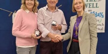 Wokingham Town Mayor Cllr Lou Timlin presented Wendy and Nigel Preston with Civic Awards, at The WELL, Wokingham. PIcture: courtesy of Kings Church