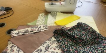 Adult learners from Activate Learning have created tote bags for grieving friends and families to take home their loved one's belongings from hospital. Picture: Activate Learning