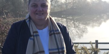 Pauline Jorgensen outside the Hall Farm site where 4000 houses are set to be built