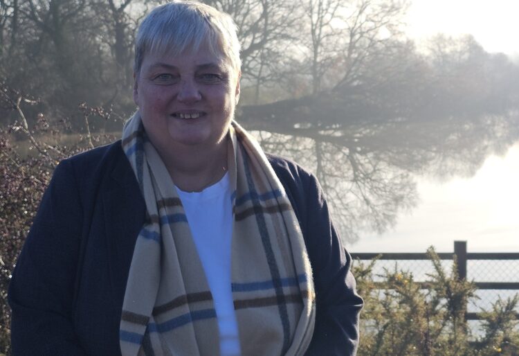Pauline Jorgensen outside the Hall Farm site where 4000 houses are set to be built