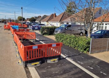 The newly created active travel path for cyclists and pedestrians outside homes in Woodlands Avenue for the Woodley to Reading active travel route. Credit: Wokingham Borough Council
