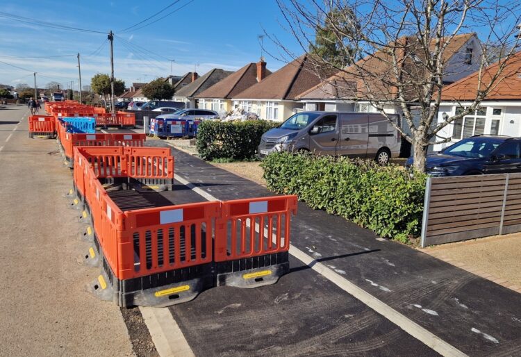 The newly created active travel path for cyclists and pedestrians outside homes in Woodlands Avenue for the Woodley to Reading active travel route. Credit: Wokingham Borough Council