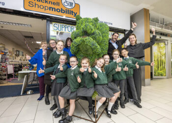 Pictued are: team members from Shopmobility, children representing Winkfield St Mary's CE Primary, Mick Conway, environmental services manager at The Lexicon, Rachel Tomkins, headteacher at Winkfield St Mary's CE Primary School.. Pic: Stweart Turkington.