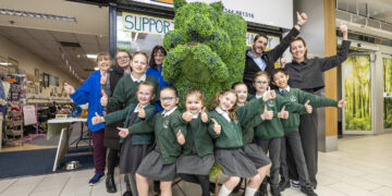 Pictued are: team members from Shopmobility, children representing Winkfield St Mary's CE Primary, Mick Conway, environmental services manager at The Lexicon, Rachel Tomkins, headteacher at Winkfield St Mary's CE Primary School.. Pic: Stweart Turkington.
