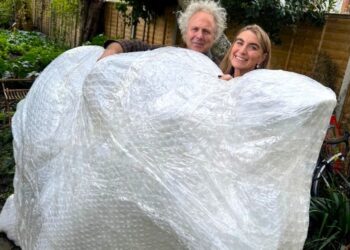 Charlie Mackesy (here with Dr Rachael de Caux) will design and hand-paint one of Thames Hospice's Trunks across the Thames elephant sculptures. Picture: Thames Hospice