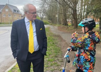 Clive Jones MP and Theo Pitts discussing safety concerns about crossing tSheerlands Road and Rowcroft Road junction. Image: Office of Clive Jones MP..