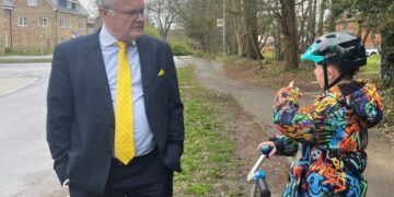 Clive Jones MP and Theo Pitts discussing safety concerns about crossing tSheerlands Road and Rowcroft Road junction. Image: Office of Clive Jones MP..