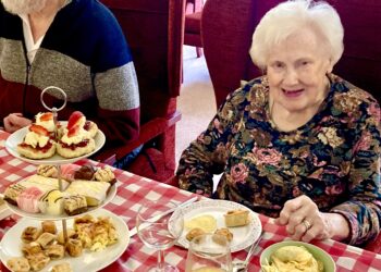 Cicely feels more 39 than 93 as she celebrates at Westende with friends. Picture: Emma Merchant