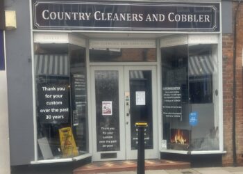 A sign has appeared in the window of Country Dry Cleaners and Cobblers in Denmark Street. Pic: Andrew Batt.