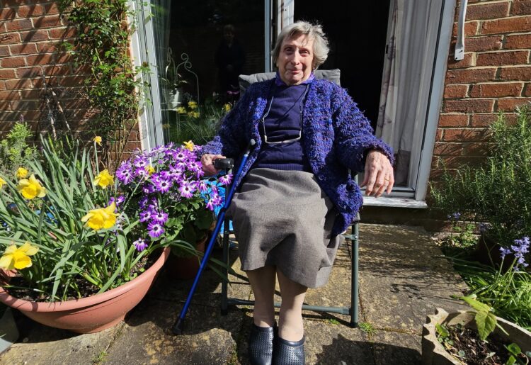 Betty Cave - 95 with her home grown Violet Senetti which will have to be removed.