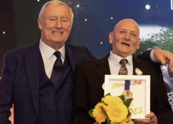 Ronnie (right) was given his Pride of Reading Award by television personality Chris Tarrant. Image: Dijana Capan.