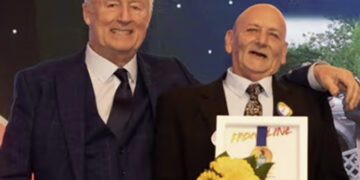 Ronnie (right) was given his Pride of Reading Award by television personality Chris Tarrant. Image: Dijana Capan.