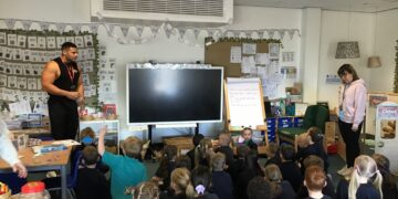 Zack George, ak Steel, touring classrooms to speak to pupils.