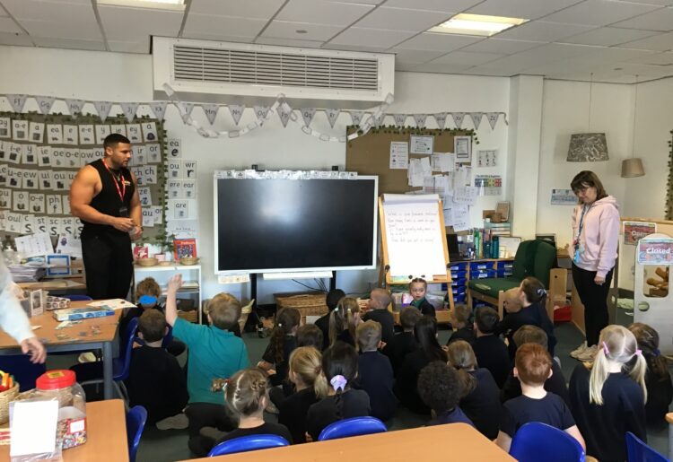Zack George, ak Steel, touring classrooms to speak to pupils.