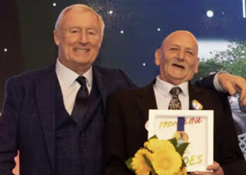 Ronnie (right) was given his Pride of Reading Award by television personality Chris Tarrant. Image: Dijana Capan.