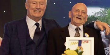 Ronnie (right) was given his Pride of Reading Award by television personality Chris Tarrant. Image: Dijana Capan.