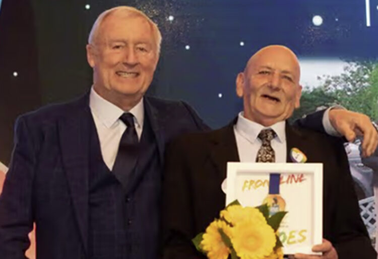 Ronnie (right) was given his Pride of Reading Award by television personality Chris Tarrant. Image: Dijana Capan.