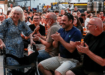 Margaret Wrigley steps up to accept her award at the 2025 TradeMark Berkshire Football Awards. Photo: Darren Woolley.