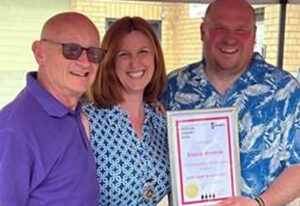 Kevin Lenton, BSE chairman, deputy mayor of Wokingham town council, Cllr Alexandra Domingue, present Andy Parker, owner of Elusive Brewing, with his certificate.